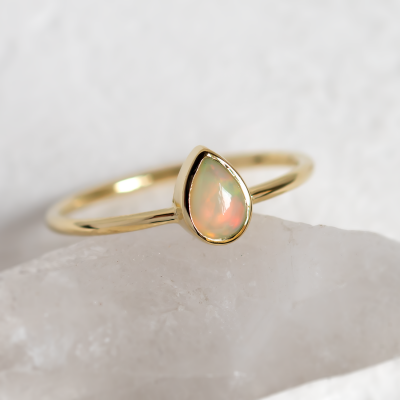 Pear white opal ring in solid gold FINN
