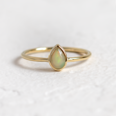Pear white opal ring in solid gold FINN