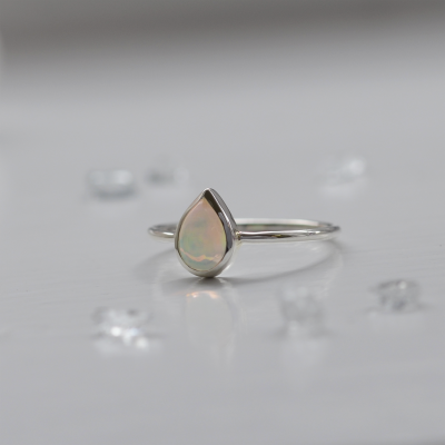 Pear white opal ring in solid gold FINN