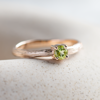 Gold ring in tree bark shape with peridot OLIVE