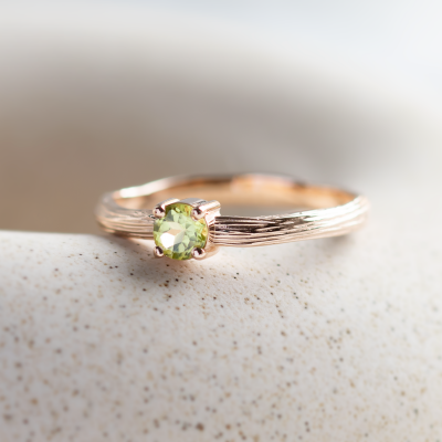 Gold ring in tree bark shape with peridot OLIVE