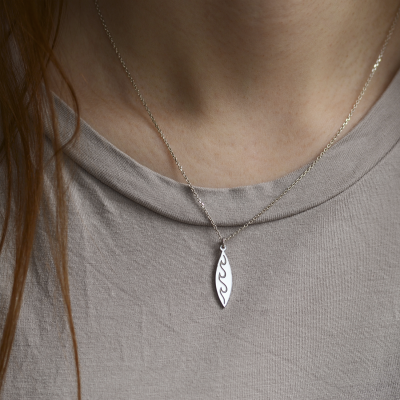 Silver pendant with engraving of waves  ALOHA