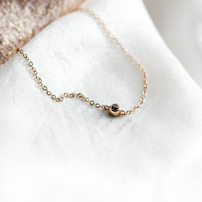 Gold bracelet with a black diamond BALA