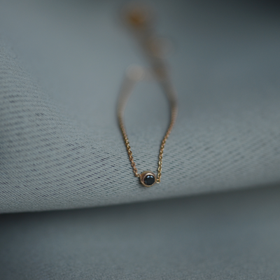 Gold bracelet with a black diamond BALA