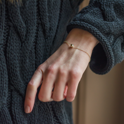 Gold bracelet with a special cube and diamond Gimle