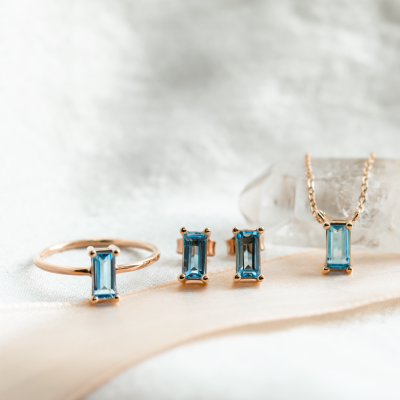 Gold jewellery set with blue topaz GENEVA