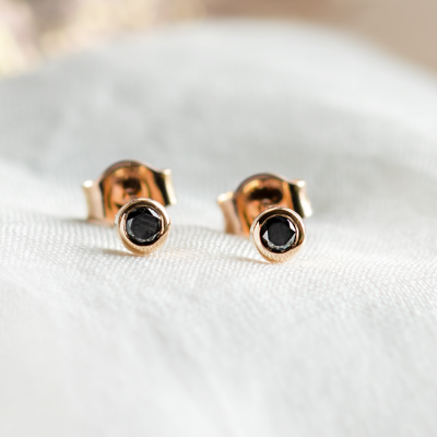 ANY Golden stud earrings with a black diamond