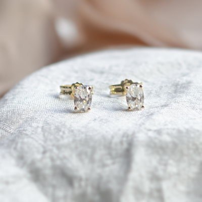 Gold minimalist earrings with oval moissanites CAROLYNE