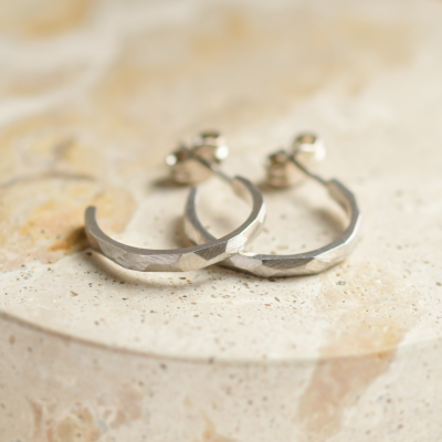 Gold circle earrings with hammered surface ISLA