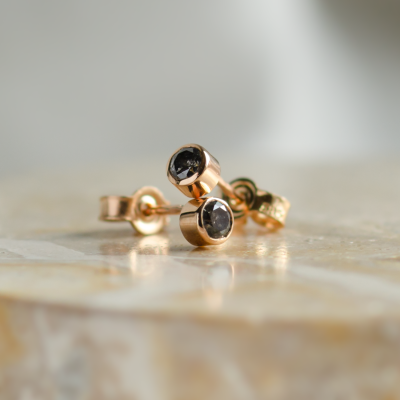 Minimalist gold earrings with salt and pepper diamonds in bezel setting NOLA