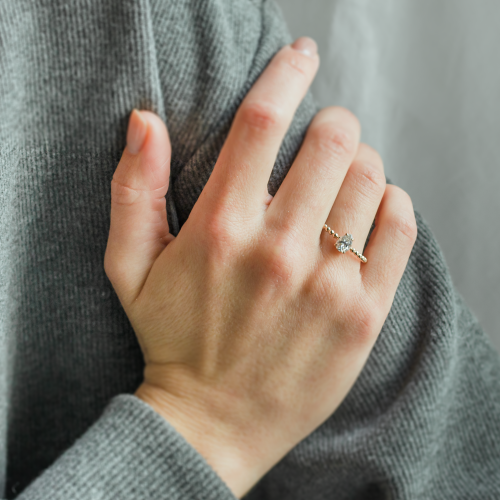 Gold engagement ring with beaded ball setting and pear moissanite BEAU