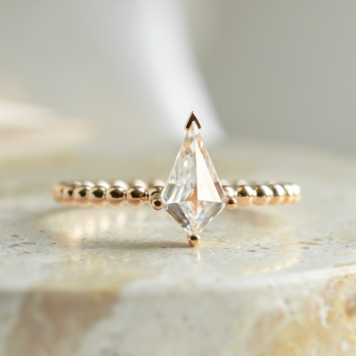 Engagement ring with beaded ball setting and kite moissanite BREEZE
