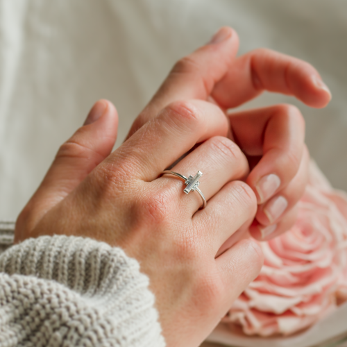 An unconventional engagement ring with a central baguette moissanite ETHEL