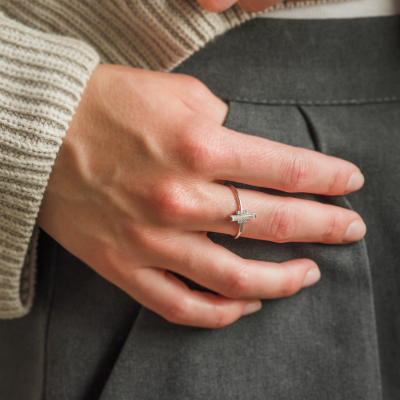 An unconventional engagement ring with a central baguette moissanite ETHEL