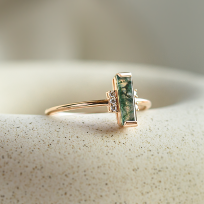 Unusual engagement ring with baguette moss agate and diamonds BRONTE