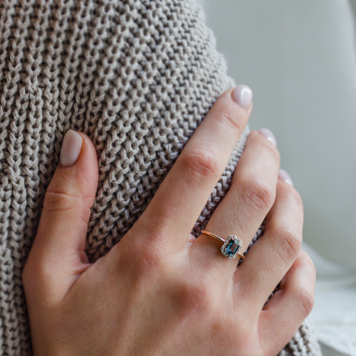 Halo gold ring with teal baguette sapphire and diamonds CELADON