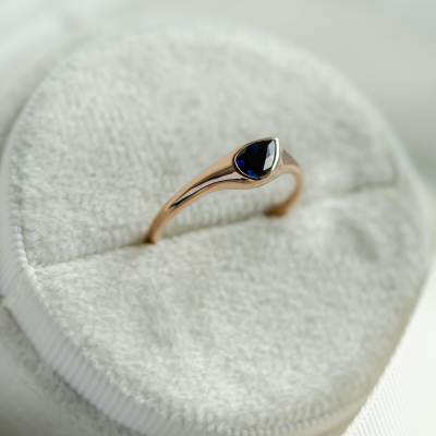 Gold ring with pear blue sapphire DREW