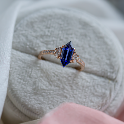 Ring with blue lab grown sapphire and moissanites ELLIS