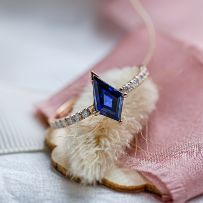Gold ring with blue lab grown sapphire and moissanites ZEPHYR