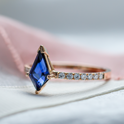 Gold ring with blue lab grown sapphire and moissanites ZEPHYR