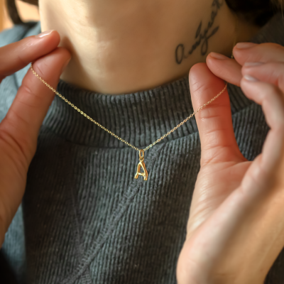 Gold letter pendant with diamond JEAN