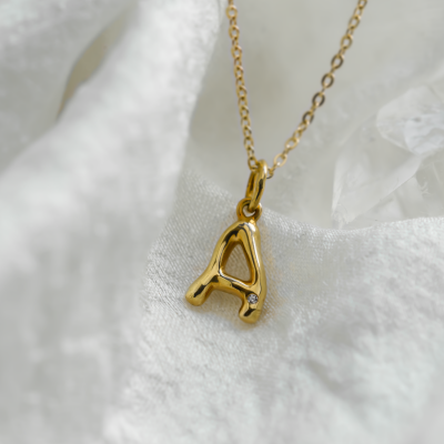 Gold letter pendant with diamond JEAN