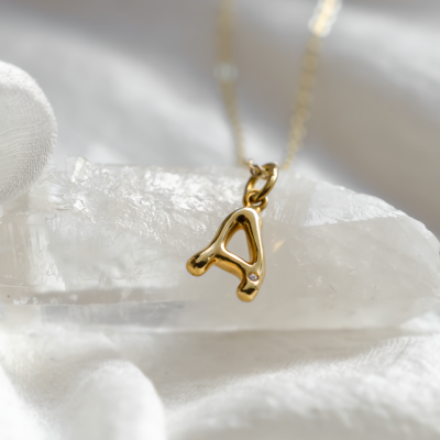 Gold letter pendant with diamond JEAN