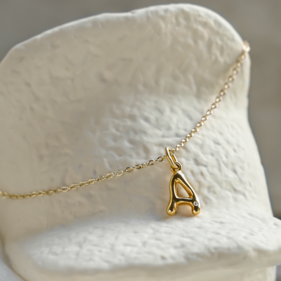 Gold letter pendant with diamond JEAN