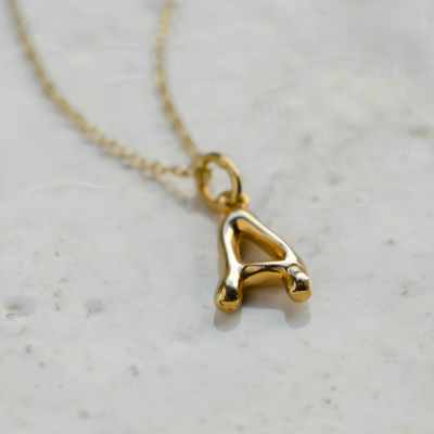 Gold letter pendant with diamond JEAN