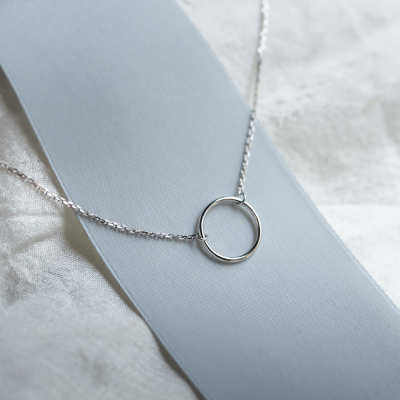 Gold minimalist necklace with a circle KARMA