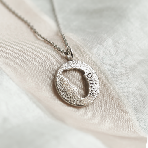 Gold necklace with unusual surface and baby foot trace LEE