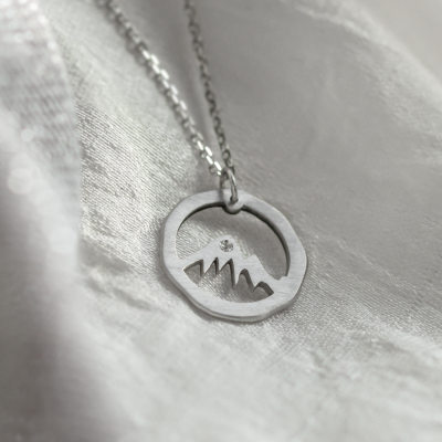Matte gold necklace with mountain motive LIVIGNO