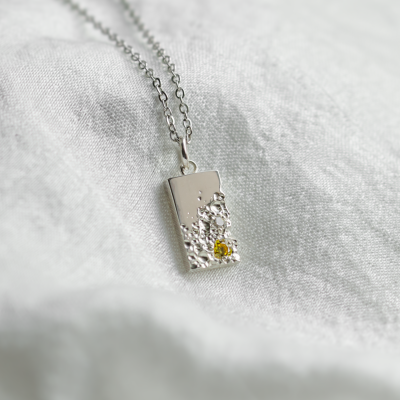 Original pendant with perforation and diamond LIZ