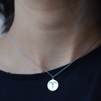 Silver pendant with a sign of zodiac ZODI