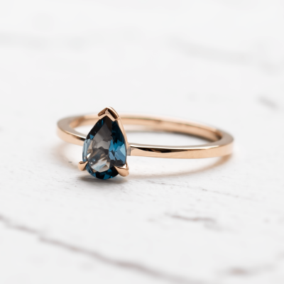 Gold ring with london blue topaz DROP