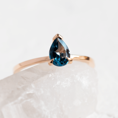 Gold ring with london blue topaz DROP