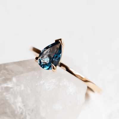 Gold ring with london blue topaz DROP