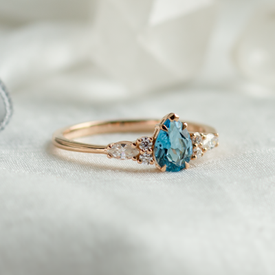 Gold ring with topaz and moissanites ASTROS