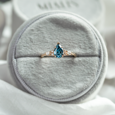 Gold ring with pear blue lab grown diamond and side diamonds AZURE