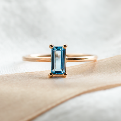 Gold ring with blue topaz CONSTANCE