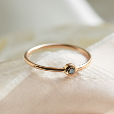 Minimalist engagement ring with salt and pepper diamond in bezel style FLAIR