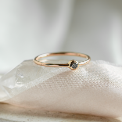 Minimalist engagement ring with salt and pepper diamond in bezel style FLAIR