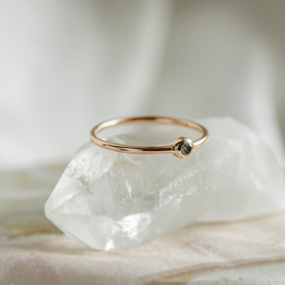 Minimalist engagement ring with salt and pepper diamond in bezel style FLAIR