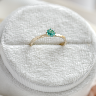 Gold engagement ring with emerald JADE
