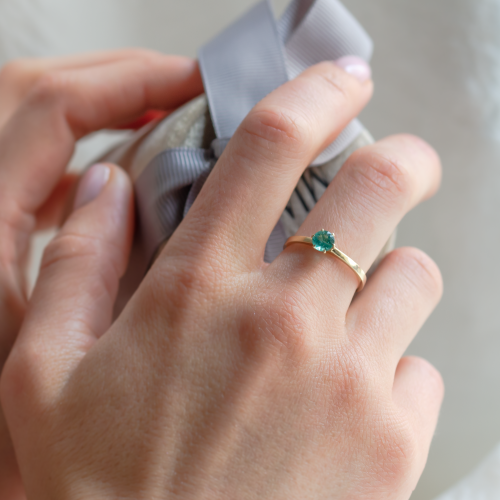 Gold engagement ring with emerald JADE