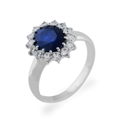 Golden ring with JUFI diamonds and a sapphire
