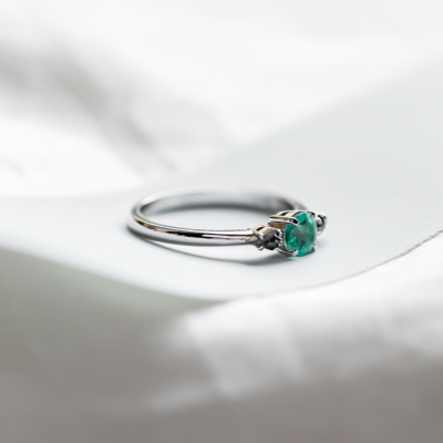 Gold ring with emerald and kite salt and pepper diamonds KIM