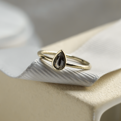 Minimalist engagement ring with pear salt and pepper diamond LAELIA