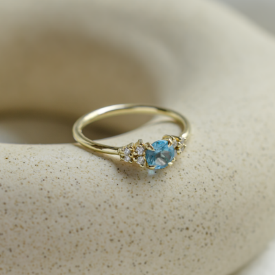 Gold ring with Swiss blue topaz and diamonds LUCIDE