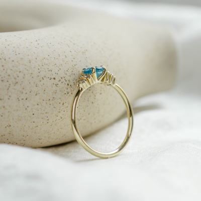 Gold ring with Swiss blue topaz and diamonds LUCIDE